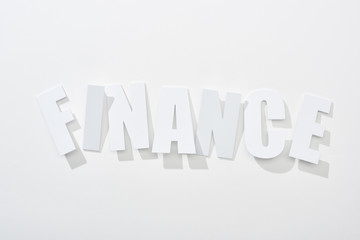 top view of finance inscription on white background