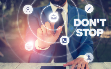 Text sign showing Don T Stop. Business photo showcasing Continue what had been doing without rendering a delay