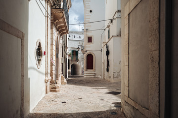 MARTINA FRANCA, ITALY / SEPTEMBER 2019: Tiny streets in the old town