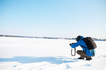 Journey. Tourist with a camera takes photos of beautiful places.