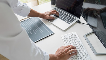 Programmer working in a software development and coding technologies. Website design. Technology...