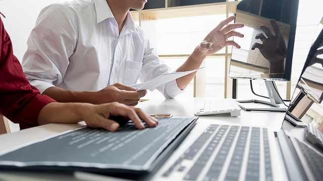Programmer working in a software development and coding technologies. Website design. Technology concept.