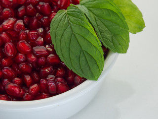 fresh pomegranate in a bowl