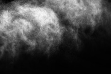 A stream of water and a cloud of drops