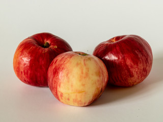 picture with red apples on a light background