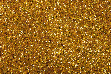 Superlative gold glitter background, your new stylish texture for perfect design look.