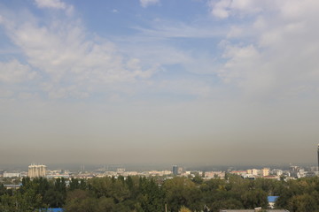 panorama of city with blue sky and clouds
