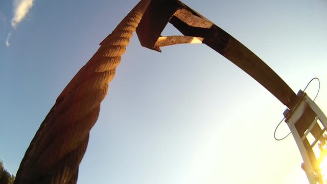 Close-up of balancing the drive rod pumps oil rocker. Oil pumps. Oil industry equipment