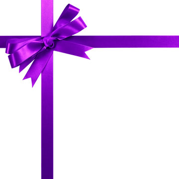 Purple gift ribbon bow vertical corner border frame isolated on white.