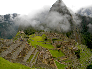 Machu Picchu view with clouds in Peru, South America. UNESCO World Heritage Site. Destination