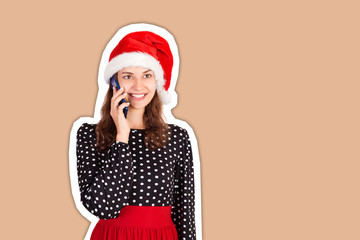 attractive woman talking on mobile phone with friend. emotional girl in santa claus christmas hat Magazine collage style with trendy color background