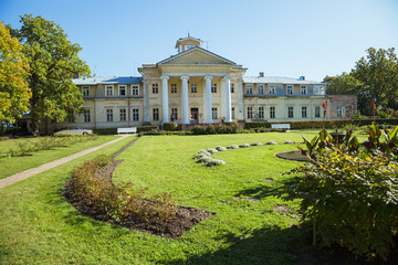 Obraz premium City Krimulda, Latvia Republic. Old manor with garden in Autumn. 27. Sep.2019.