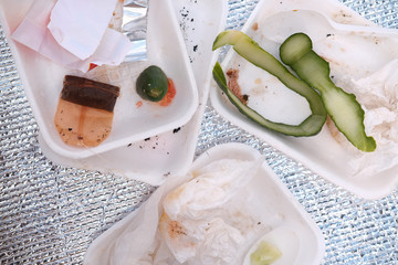 Various plastic trash remains, close-up