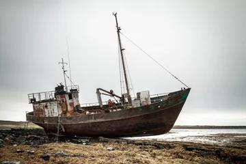 Garden poster Schip Abandoned ship on the coast of the Arctic Ocean.