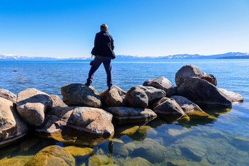 A Hiker enjoying beautiful day at Lake Tahoe, California