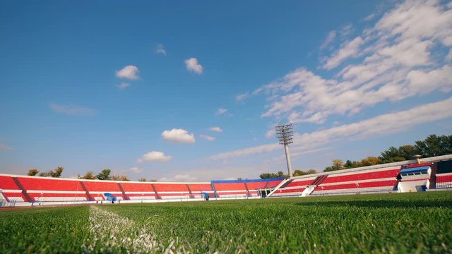 A ball is getting hit by an athlete with a bionic leg