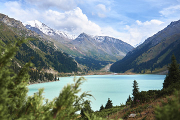 Naklejka na ściany i meble Mountain Lake Bao in Almaty. Beautiful nature, summer green landscape of sunny Kazakhstan
