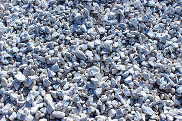 Background of gray granite gravel.