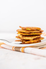 a stack of pancake cheesecakes in the plate