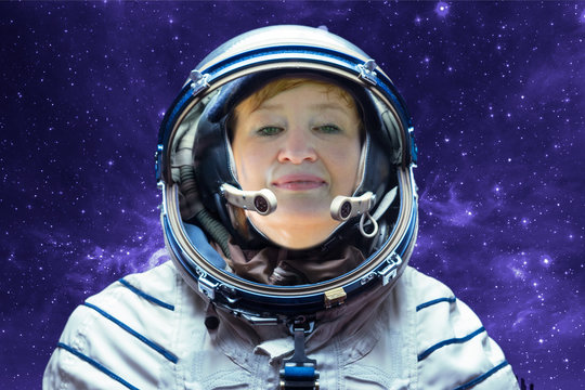 happy astronaut woman portrait in the protective scafander on the space mission