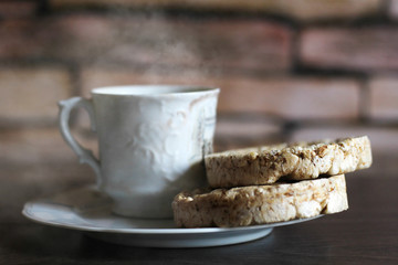 A Cup of steamed coffee and healthy corn breads