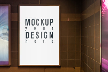 Mock up of light box in a city on the wall for your advertising. Blank mock up of vertical street...