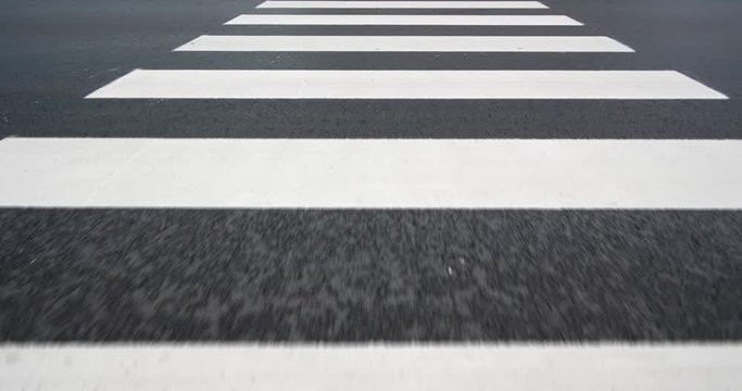 4K - Motion across zebra crossing. Pedestrian crossing