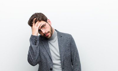 young manager man feeling bored, frustrated and sleepy after a tiresome, dull and tedious task,...