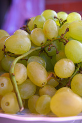 Grapes can be eaten fresh as table grapes or they can be used for making wine, jam, juice, jelly, grape seed extract, raisins, vinegar, and grape seed oil. Grapes are a non-climacteric type of fruit