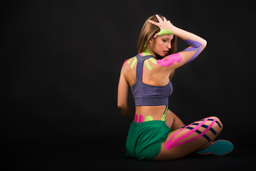 Fototapeta premium Portrait of a motivated woman, alternative kinesio therapy