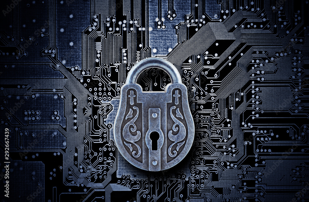 Poster computer security concept. old mysterious padlock on computer circuit board