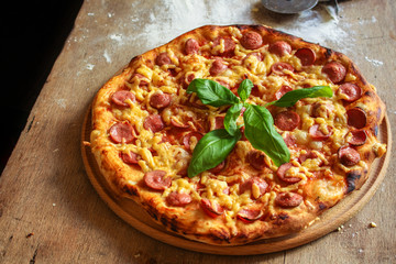 pizza with salami, sausage and cheese (delicious snack) menu concept. food background. copy space. Top viev