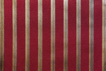 Red and gold striped background or decorative texture in official classic style, with soft...