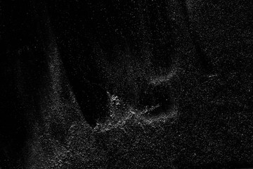 abstract real dust floating over black background for overlay - obrazy, fototapety, plakaty