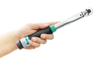 Torque wrench in hand isolated on a white background