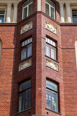 Moscow, Russia, August 27, 2019. Fragment of the facade of a typical historic modernist building on Petrovka Street