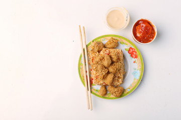 teriyaki chicken rice with crackers isolated