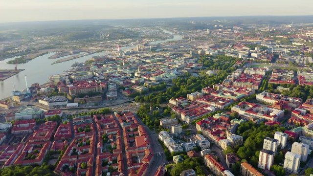 Gothenburg, Sweden. Panorama of the city and the river Goeta Elv. The historical center of the city. Sunset, Aerial View, Departure of the camera