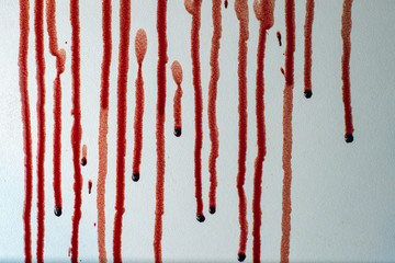 jets of blood on a white surface, short focus, toning