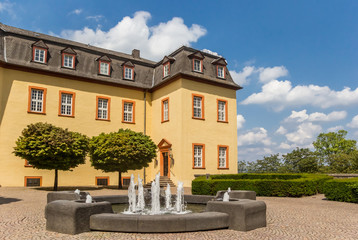 Fototapeta na wymiar Fountain in the garden of castle Hachenburg, Germany