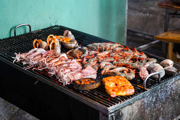Street food in Phu Quoc island in Vietnam. Delicious seafood for tourist at market at night.