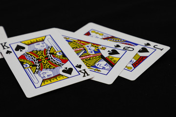 Playing Card with black background, Poker. Blackjack.