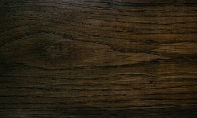 Dark oak wood board closeup