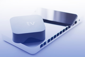 Smart home and media concept.  Cloud switch, smart media player and laptop on the white background....
