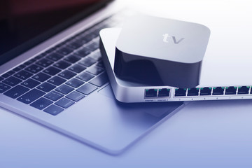 Smart home and media concept.  Cloud switch, smart media player and laptop on the white background....