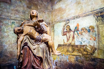 Original frescos and wooden statue in the Jesuit Church in Santa Rosa, Paraguay