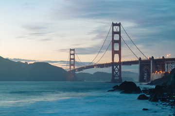 Fototapeta na wymiar Sunset at the iconic Golden Gate Bridge in San Francisco, California. travel destination, bucket list, tourism, discover USA, United States of America
