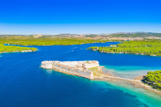 Old stone St. Nicholas fortress at Sibenik bay entrance, archipelago od Dalmatia, Croatia, drone aerial shot