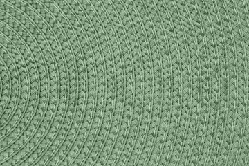 Olive green textured concentric circle fabric material background
