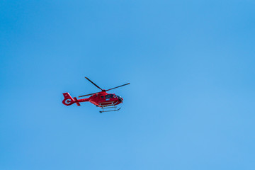 Fototapeta na wymiar Rescue helicopter and blue sky
